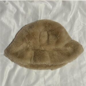 Tan and cream faux fur bucket hat from asos ! super cute size small
